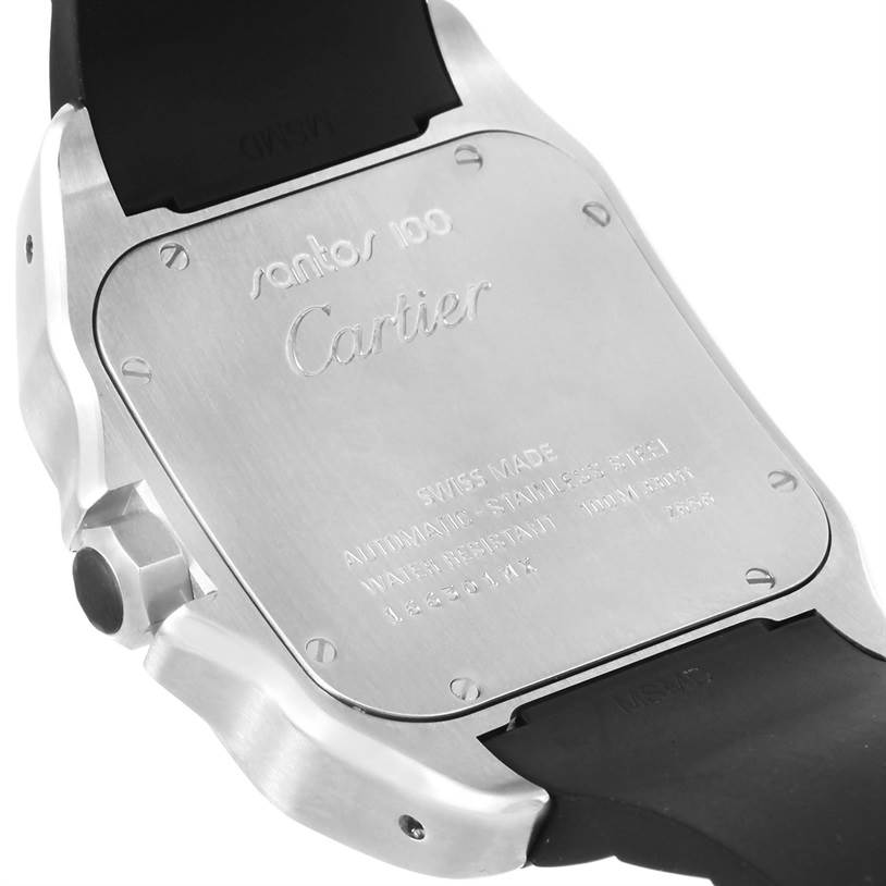 The image shows the back case of a Cartier Santos W20121U2 Men
s Stainless Steel Silver Dial W20121U2 Men
s Stainless Steel Silver Dial 100 watch, focusing on its stainless steel case and markings.
