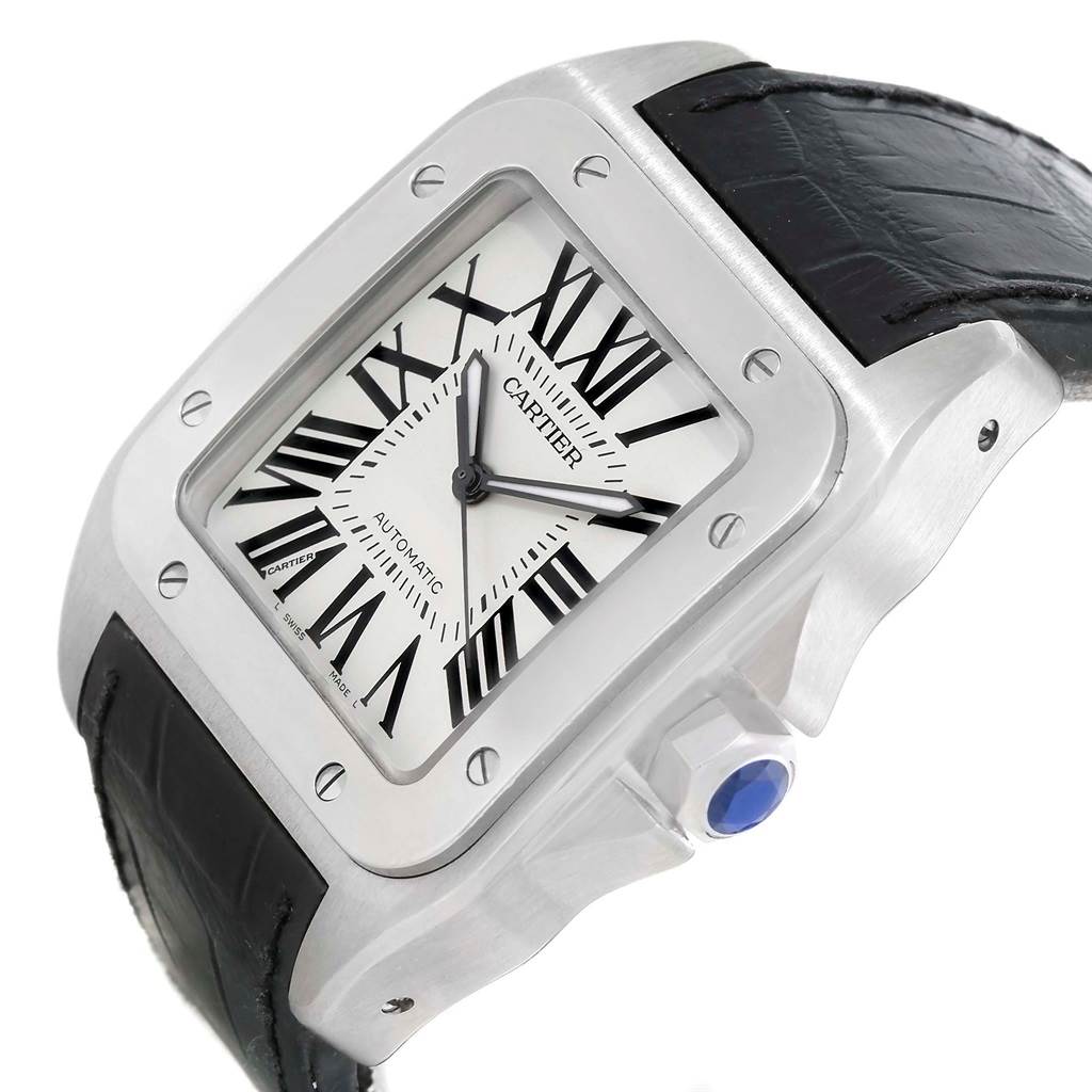 This Cartier Santos W20073X8 Men's Stainless Steel Silver Dial W20073X8 Men's Stainless Steel Silver Dial watch is shown at a slight angle, highlighting its square face, Roman numerals, bezel, and black leather strap.