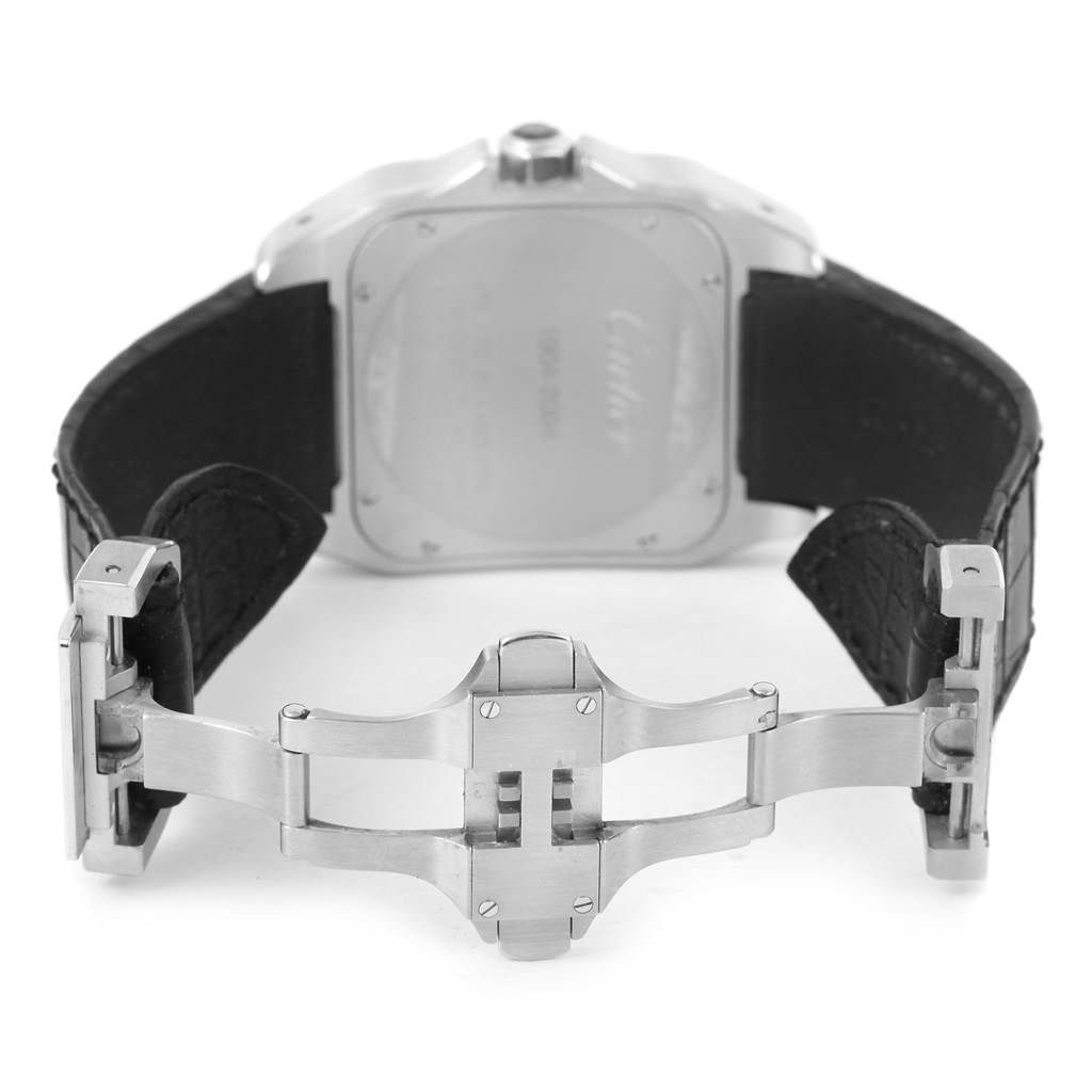The image shows the back view of a Cartier Santos W20073X8 Men
s Stainless Steel Silver Dial W20073X8 Men
s Stainless Steel Silver Dial watch, focusing on its case back and deployment clasp.