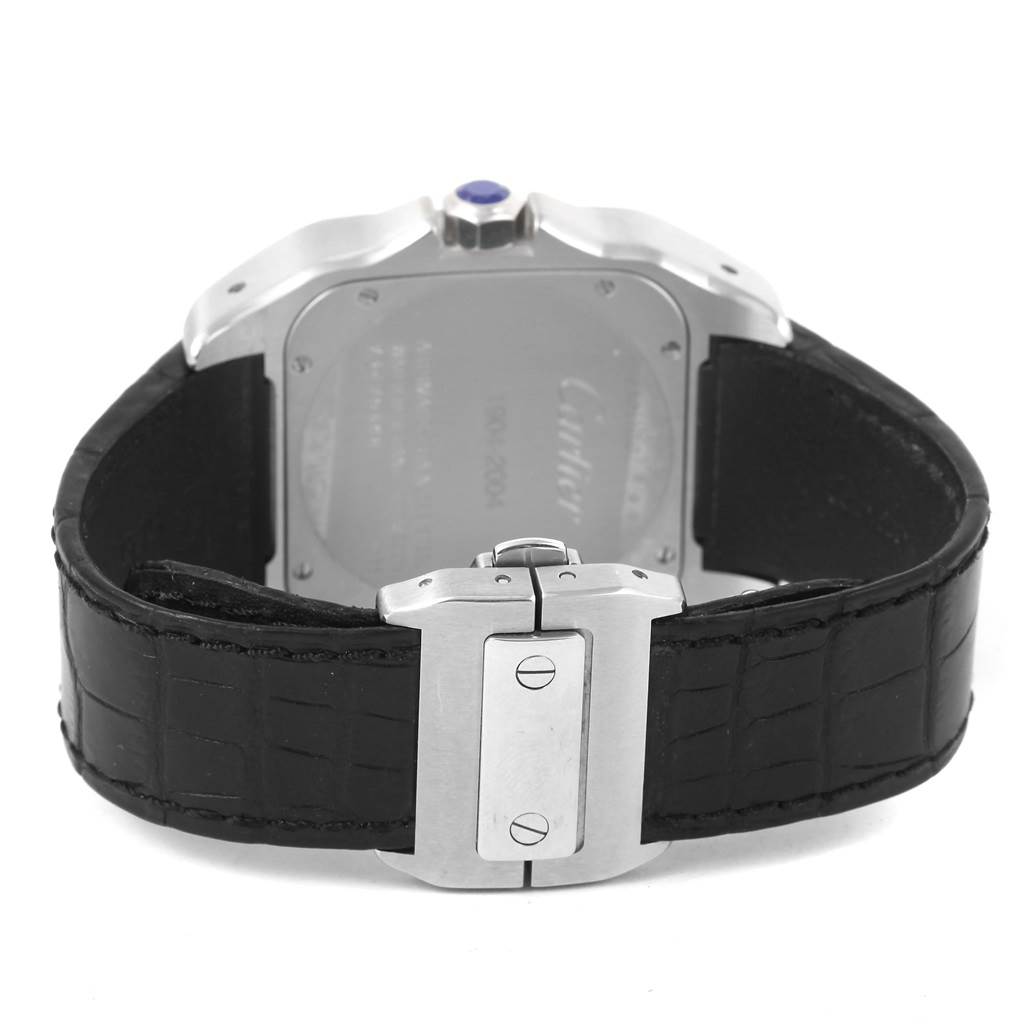 This image shows the back case and the clasp of a Cartier Santos W20073X8 Men
s Stainless Steel Silver Dial W20073X8 Men
s Stainless Steel Silver Dial watch, featuring a leather strap.