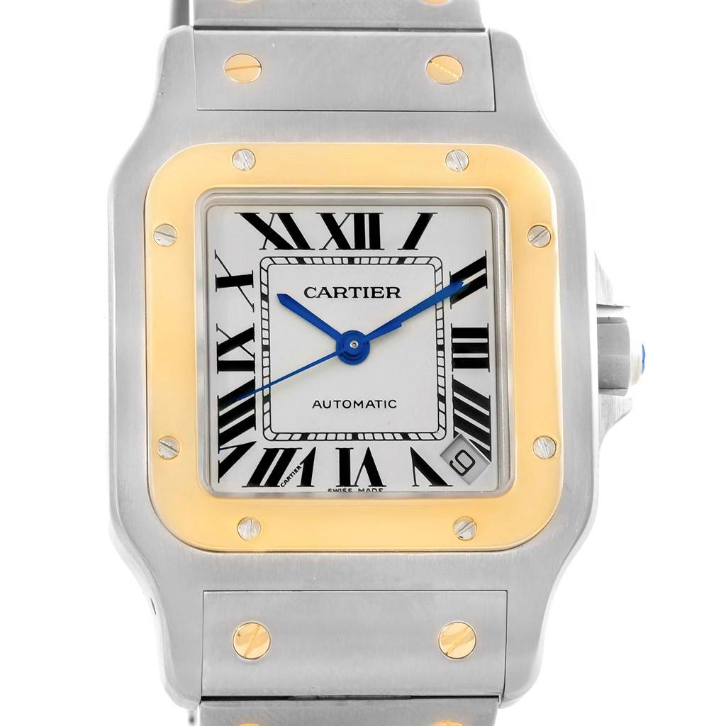 The image shows a close-up front view of the Cartier Santos W20099C4 Men
s Stainless Steel Silver Dial W20099C4 Men
s Stainless Steel Silver Dial watch, highlighting its face, bezel, and part of the strap.