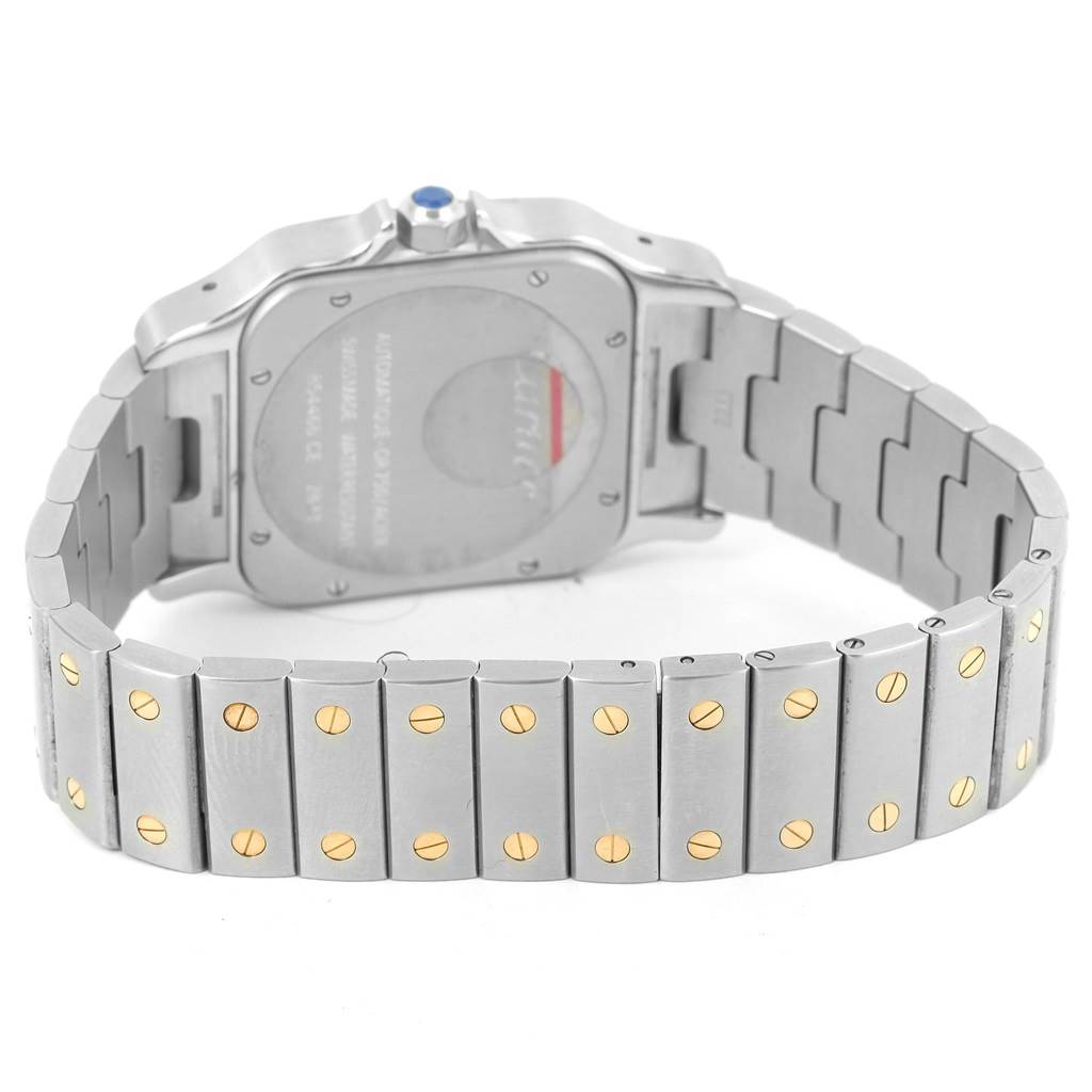 This image shows the back and bracelet of a Cartier Santos W20099C4 Men
s Stainless Steel Silver Dial W20099C4 Men
s Stainless Steel Silver Dial watch, featuring gold screws on a silver band.