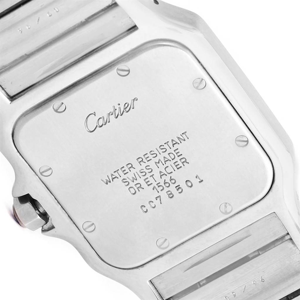 The image shows the back case of a Santos model by Cartier, highlighting the inscriptions and screws.