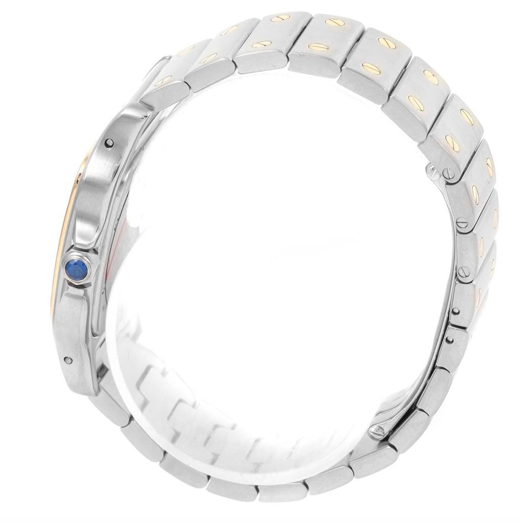 The image shows a side view of the Cartier Santos 1566 Stainless Steel Silver Dial 1566 Stainless Steel Silver Dial watch
s metal bracelet and part of the casing, including the crown with a blue stone.