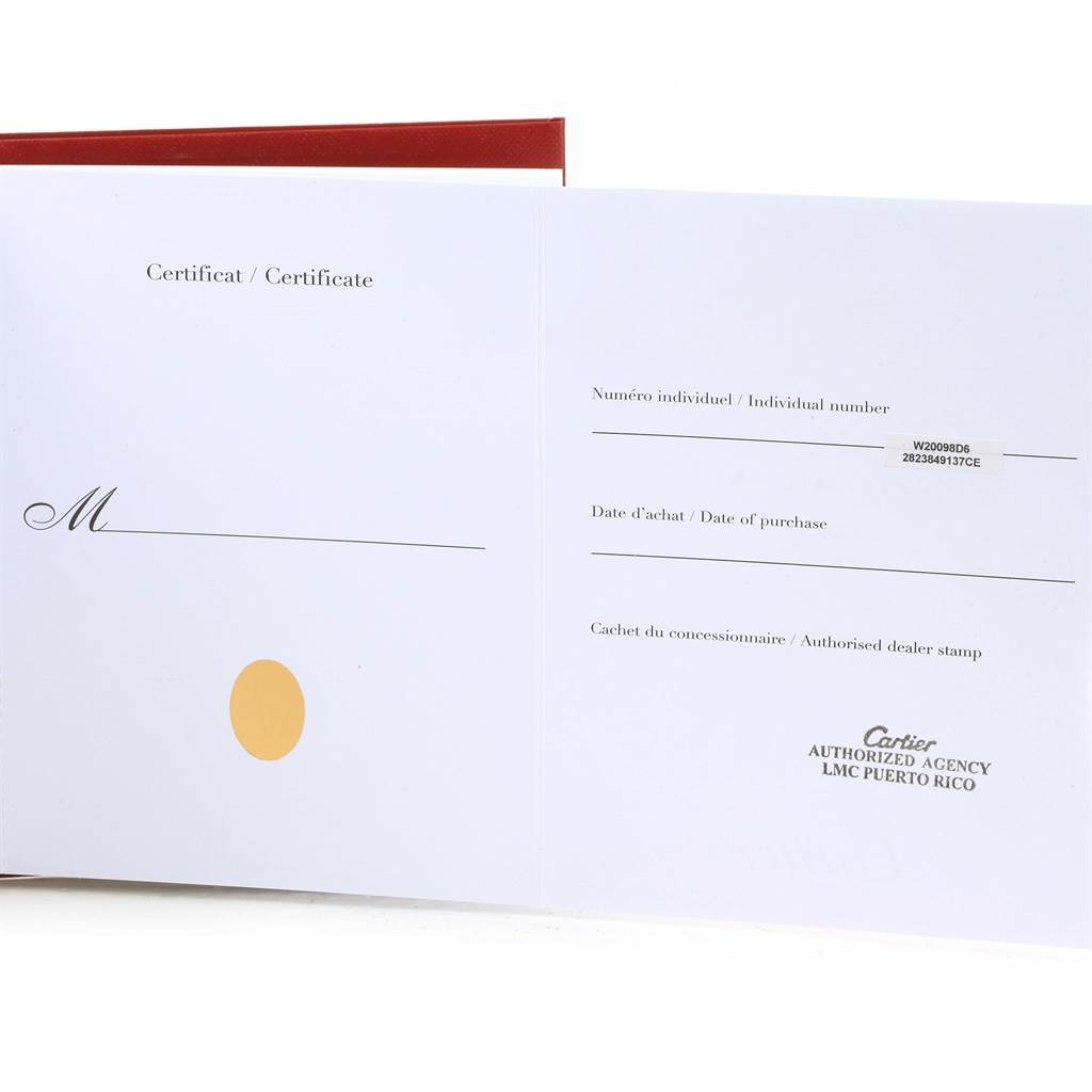 The image shows an open warranty certificate for a Cartier Santos W20098D6 Men
s Stainless Steel Silver Dial W20098D6 Men
s Stainless Steel Silver Dial watch from an authorized dealer in Puerto Rico.