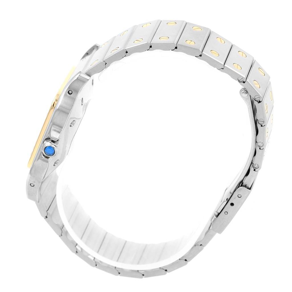 This image shows the side profile and bracelet of the Cartier Santos W20058C4 Men
s Stainless Steel Silver Dial W20058C4 Men
s Stainless Steel Silver Dial watch with a visible crown and blue cabochon.