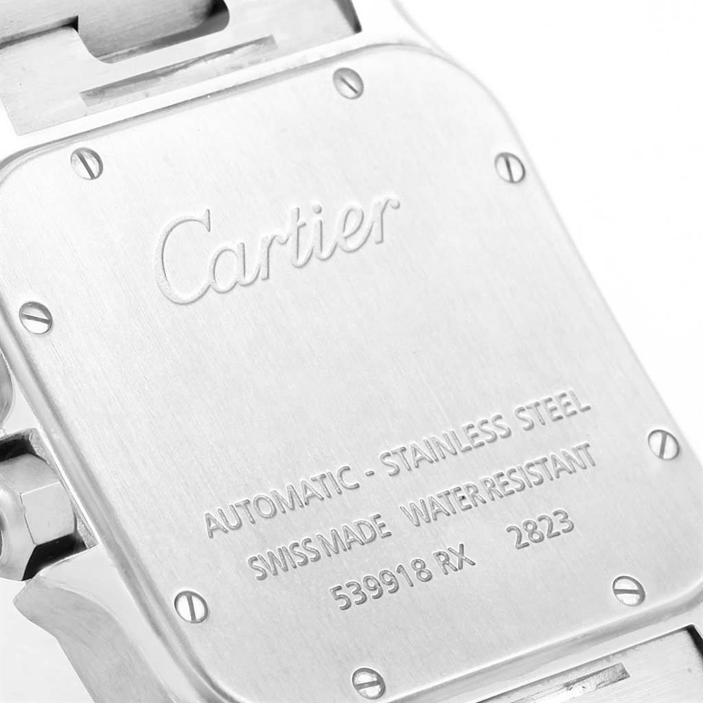 The image shows the back case of a Cartier Santos W20098D6 Men's Stainless Steel Silver Dial W20098D6 Men's Stainless Steel Silver Dial model watch, highlighting the brand engraving and specifications.