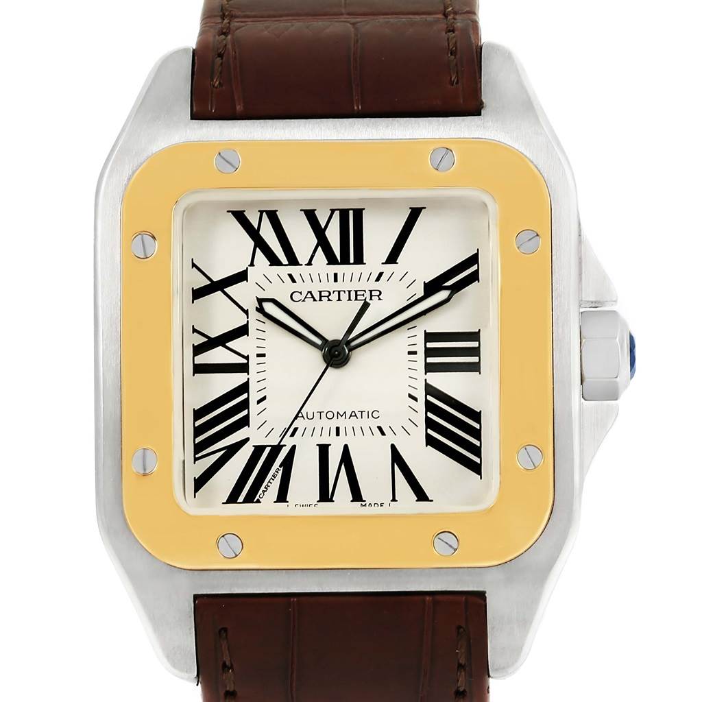 This Cartier Santos W20072X7 Men
s Stainless Steel Silver Dial W20072X7 Men
s Stainless Steel Silver Dial model watch is shown from the front, displaying its face, bezel, and part of the leather strap.