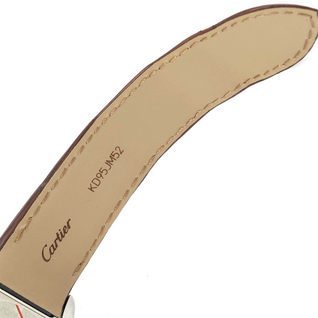 The image shows a close-up of the leather strap for a Cartier Santos W20072X7 Men
s Stainless Steel Silver Dial W20072X7 Men
s Stainless Steel Silver Dial watch, with visible stitching and branding.