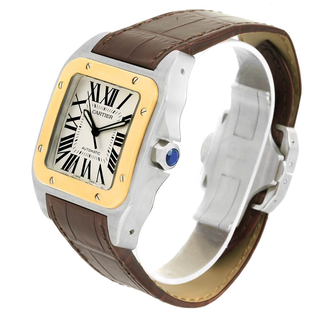 The Cartier Santos W20072X7 Men
s Stainless Steel Silver Dial W20072X7 Men
s Stainless Steel Silver Dial watch is shown from a three-quarter angle, displaying the face, bezel, crown, and leather strap.