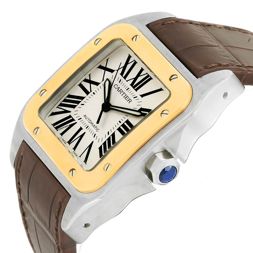 The image shows a close-up view of the Cartier Santos W20072X7 Men
s Stainless Steel Silver Dial W20072X7 Men
s Stainless Steel Silver Dial watch, highlighting the dial, bezel, crown, and leather strap.