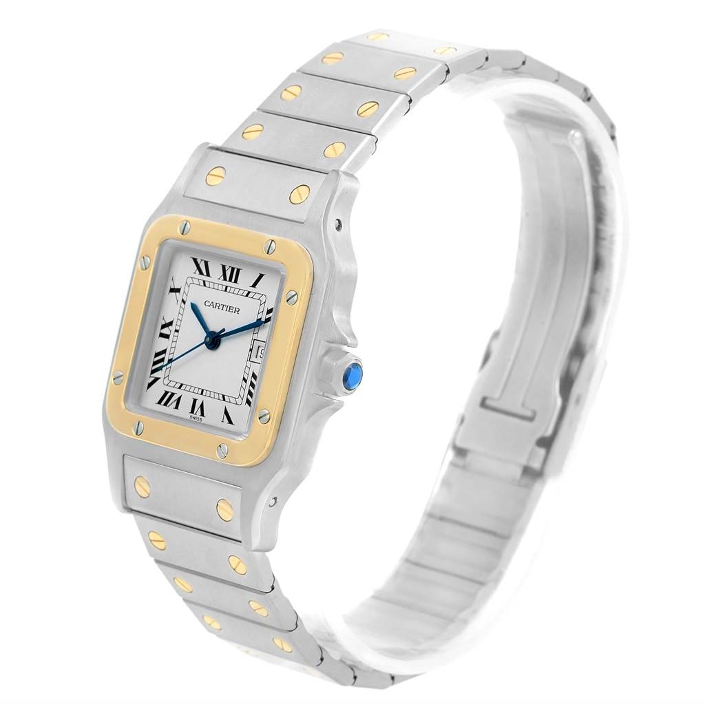 The image shows a Santos model watch by Cartier at a slight side angle, displaying the face, bezel, and bracelet.