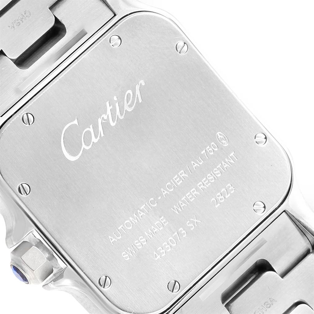 This image shows the back case of the Cartier Santos W20099C4 Men
s Stainless Steel Silver Dial W20099C4 Men
s Stainless Steel Silver Dial watch, including the brand logo and model details.