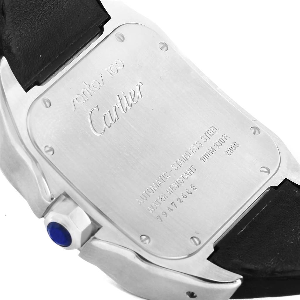 The image shows the back of a Santos model by Cartier, highlighting its case back, crown with blue stone, and strap connection.