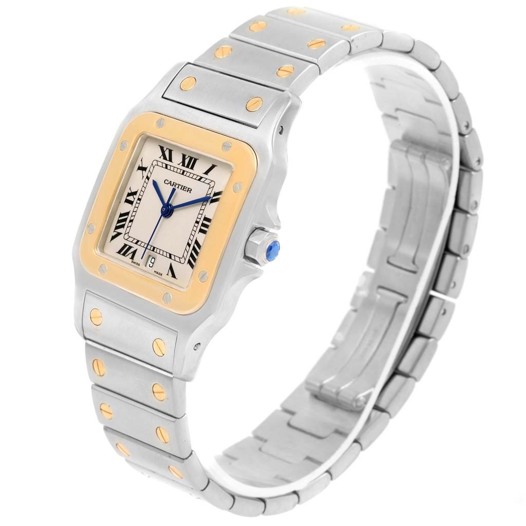 The Cartier Santos W20011C4 Stainless Steel Silver Dial W20011C4 Stainless Steel Silver Dial model watch is shown at a three-quarter view, highlighting its face, bracelet, and crown.