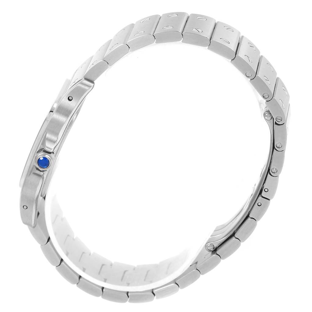 The image shows a side view of the stainless steel bracelet and crown with a blue gem of the Cartier Santos W20060D6 Stainless Steel Silver Dial W20060D6 Stainless Steel Silver Dial model watch.