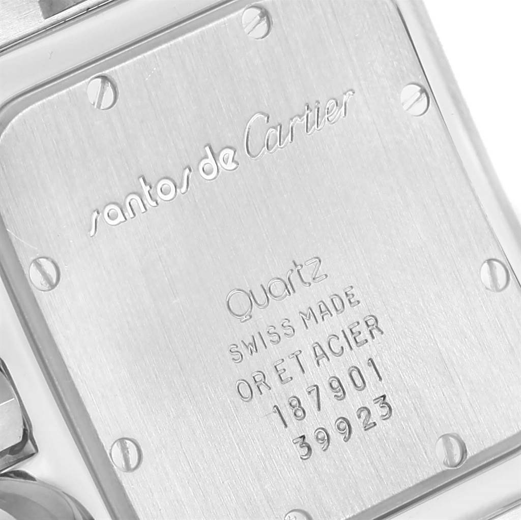 This image shows the case back of the Cartier Santos 187901 Men
s Stainless Steel Silver Dial 187901 Men
s Stainless Steel Silver Dial watch, highlighting its engravings and screws.