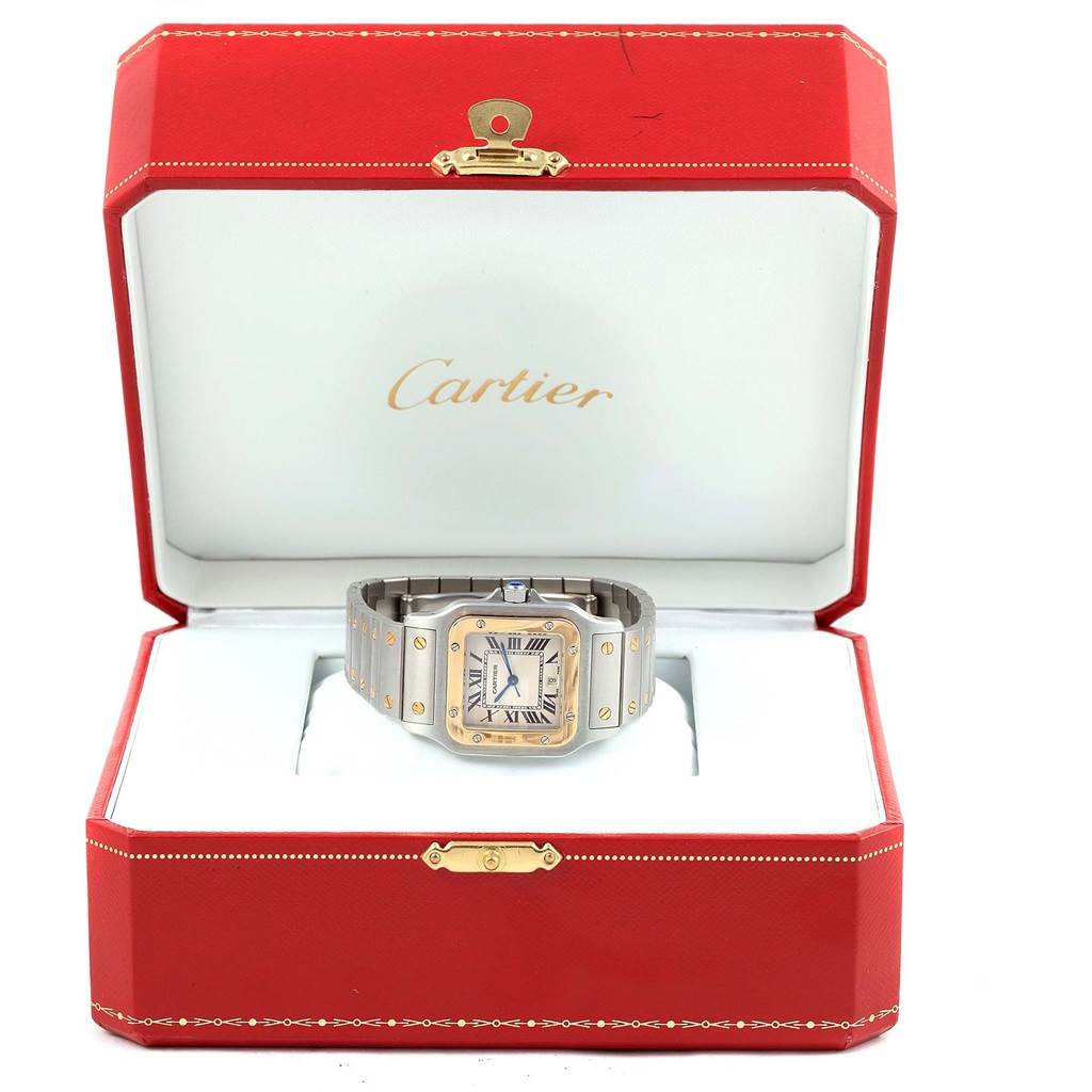 The Cartier Santos 1566 Stainless Steel Silver Dial 1566 Stainless Steel Silver Dial model watch is shown from the front, displayed inside its red and white branded box.