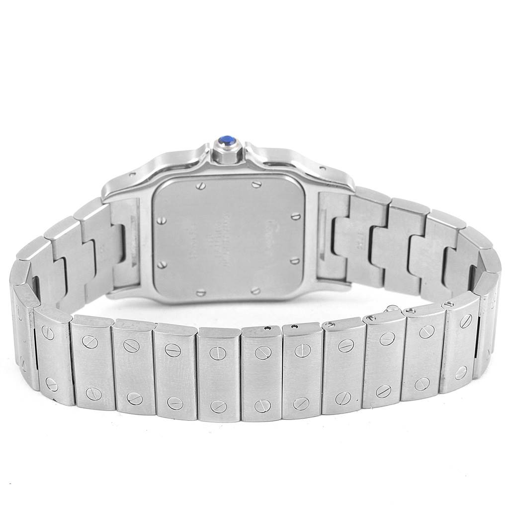 The image shows the rear view of the Cartier Santos W20060D6 Stainless Steel Silver Dial W20060D6 Stainless Steel Silver Dial watch, including the case back and part of the metal bracelet.