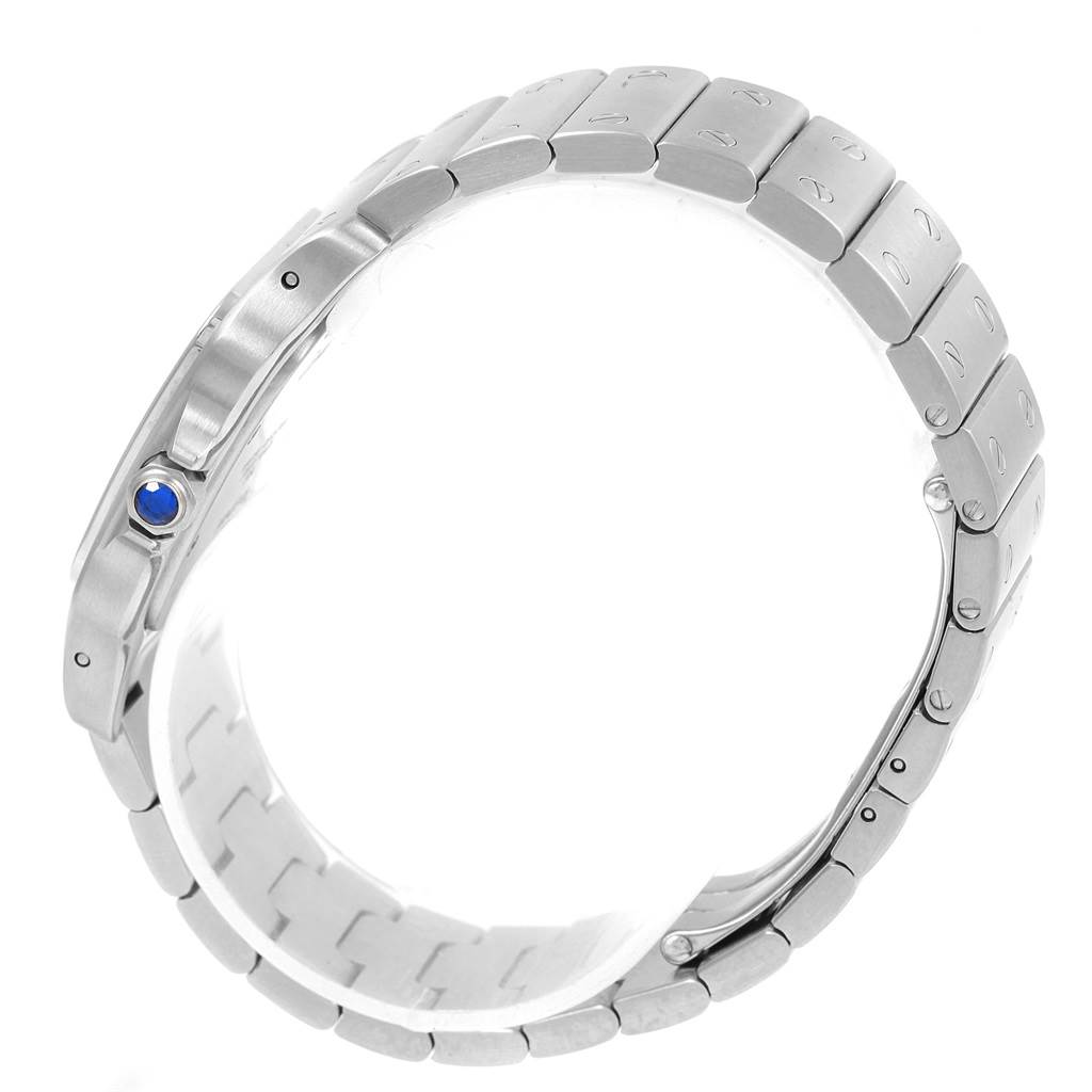 This image shows a side view of the stainless steel bracelet of a Santos model by Cartier, featuring the crown with a blue gemstone.