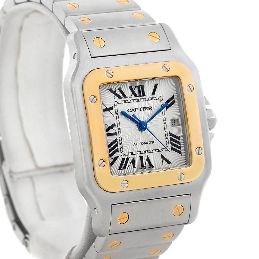 The image shows a close-up angle of the Cartier Santos W20058C4 Stainless Steel Silver Dial W20058C4 Stainless Steel Silver Dial model watch, featuring its face, bracelet, and bezel screws.