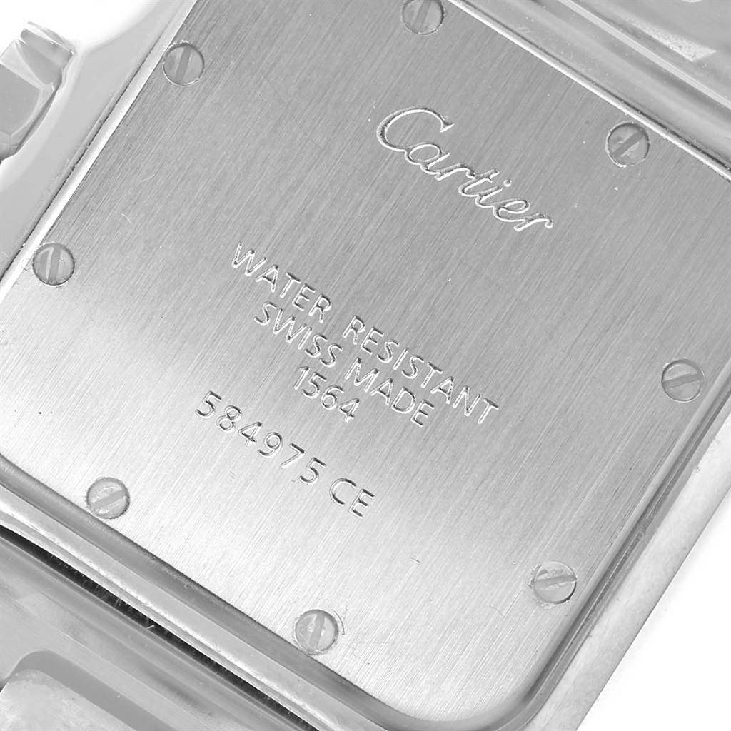 The image shows the back of a Cartier Santos W20060D6 Stainless Steel Silver Dial W20060D6 Stainless Steel Silver Dial watch, highlighting its water resistance, Swiss made label, and serial number.