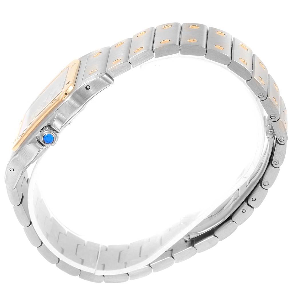 This image shows a side and partial top view of a Santos model by Cartier, highlighting the bracelet and crown.