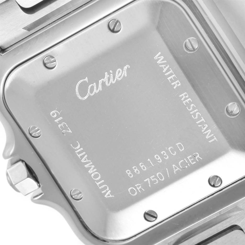 The image shows the back casing of a Santos model by Cartier from an angled close-up view.