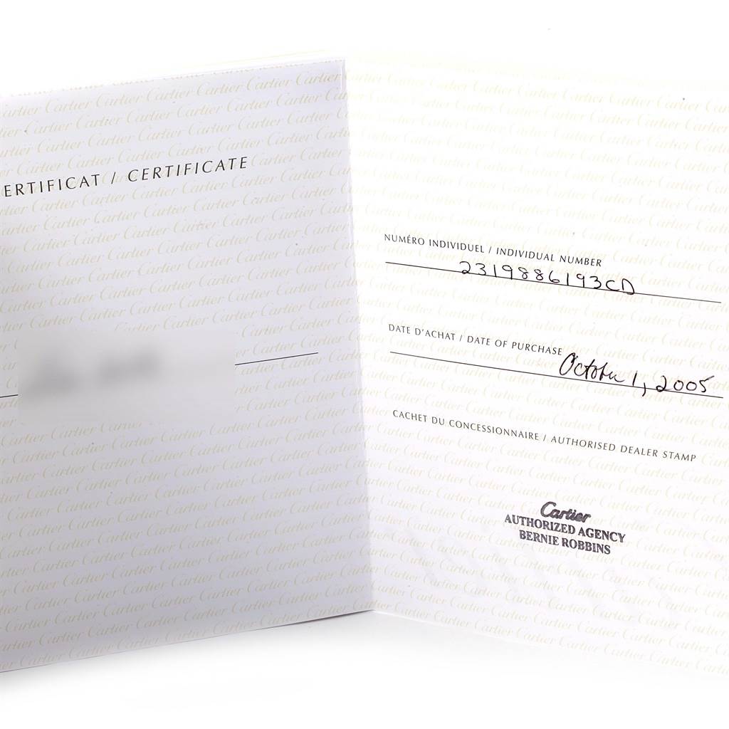 The image shows the certificate card for a Santos model by Cartier, displaying the individual number and date of purchase.