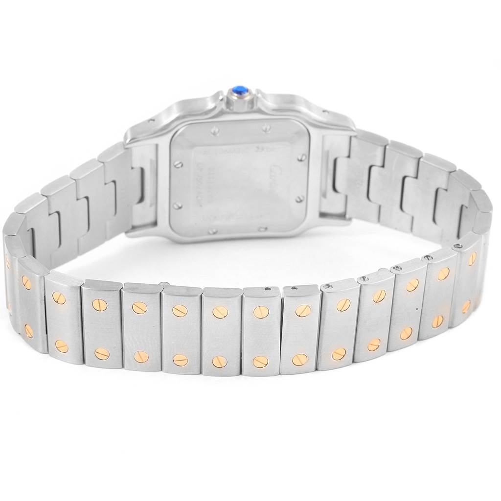 This image shows the back side and bracelet of a Santos watch by Cartier, highlighting the screw details on the bracelet.