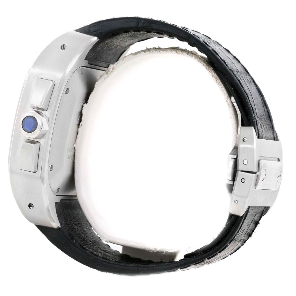 The image shows a side view of the Cartier Santos W20090X8 Men
s Stainless Steel Silver Dial W20090X8 Men
s Stainless Steel Silver Dial watch, highlighting the case, crown, and part of the leather strap with clasp.