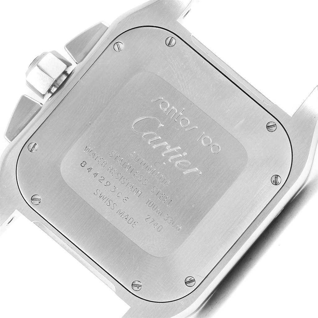 This image shows the back case of a Santos model by Cartier, highlighting its engraved details and screws.