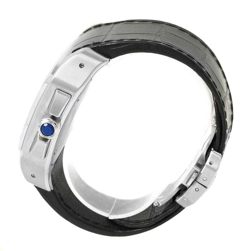 The image shows a close-up side view of the Cartier Santos W20090X8 Men
s Stainless Steel Silver Dial W20090X8 Men
s Stainless Steel Silver Dial watch, highlighting the crown and black leather strap.