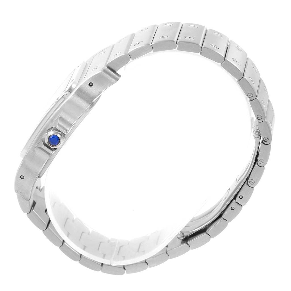 This side-angle view of the Cartier Santos W20098D6 Men's Stainless Steel Silver Dial W20098D6 Men's Stainless Steel Silver Dial watch displays its bracelet and crown with a blue cabochon.