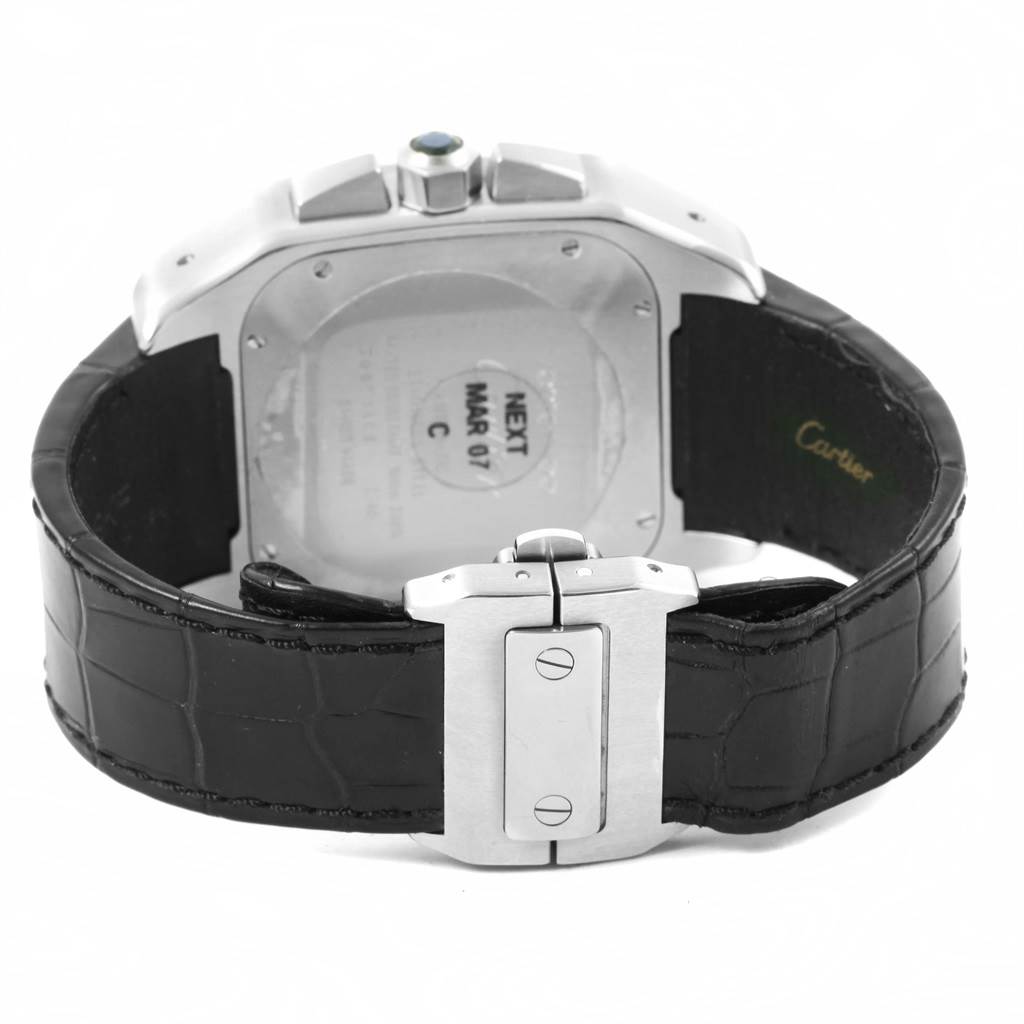 The image shows the back view of a Cartier Santos W20090X8 Men
s Stainless Steel Silver Dial W20090X8 Men
s Stainless Steel Silver Dial watch with a visible clasp and leather strap.
