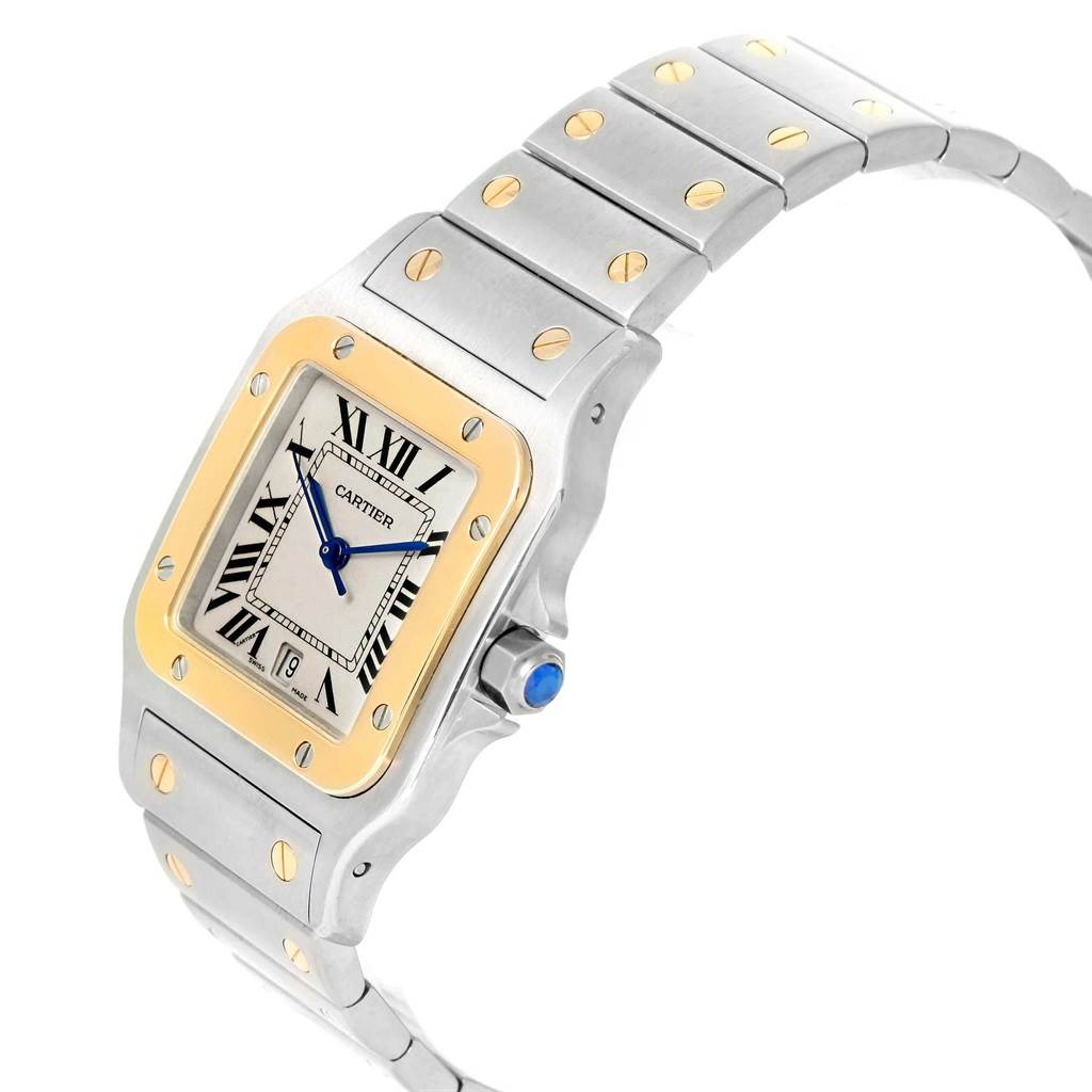 This image shows a Cartier Santos W20011C4 Stainless Steel Silver Dial W20011C4 Stainless Steel Silver Dial watch from a front-side angle, highlighting its face, bezel, and bracelet.