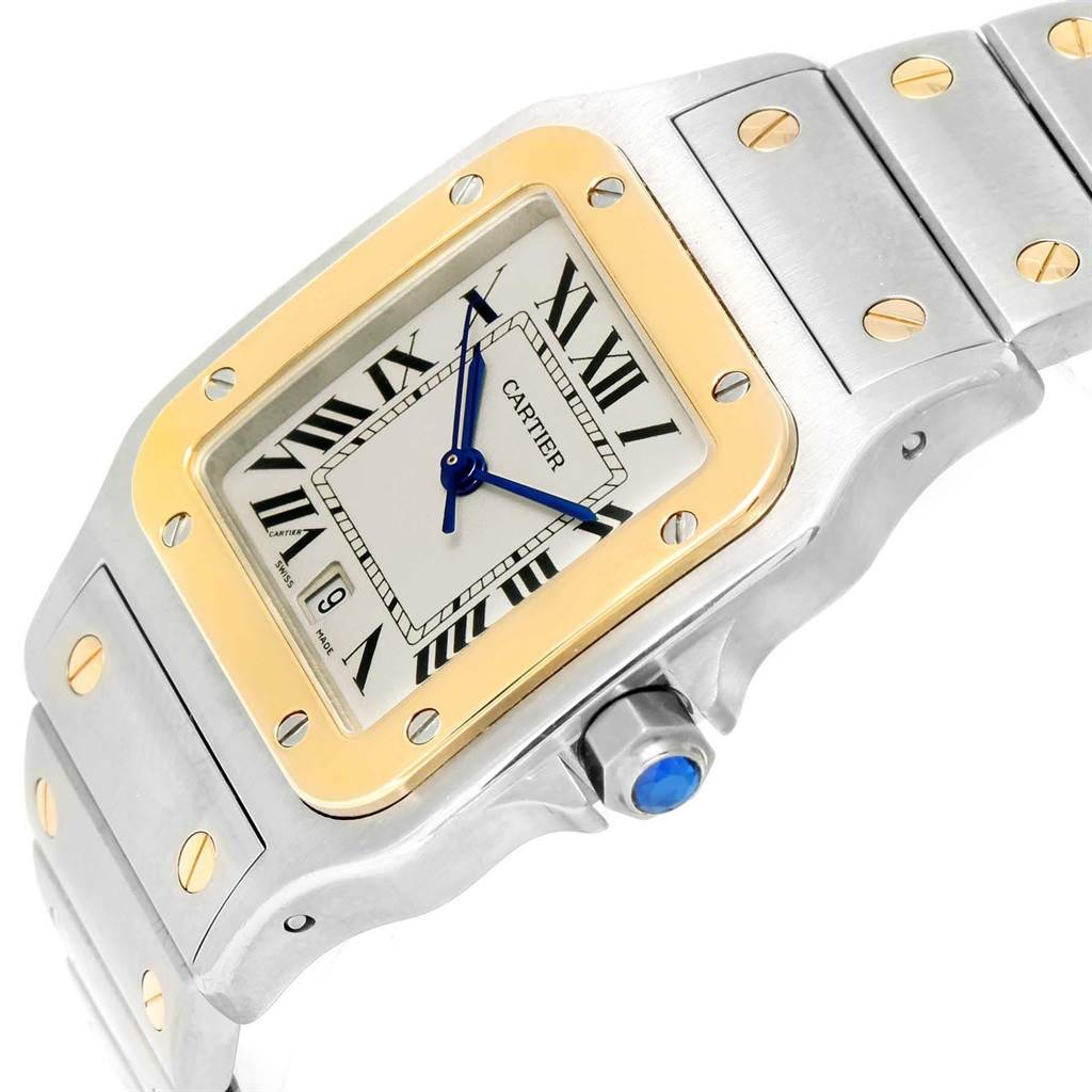 This image shows a Cartier Santos W20011C4 Stainless Steel Silver Dial W20011C4 Stainless Steel Silver Dial watch angled to display its face, bezel, crown, and part of the bracelet.