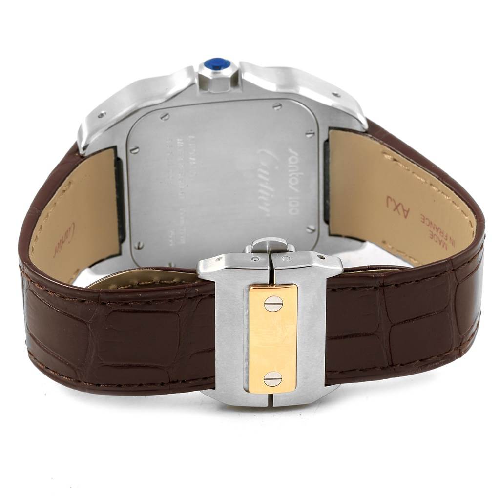 The image shows the back and clasp of a Cartier Santos W20072X7 Men
s Stainless Steel Silver Dial W20072X7 Men
s Stainless Steel Silver Dial watch, highlighting its leather strap and engraved case back.