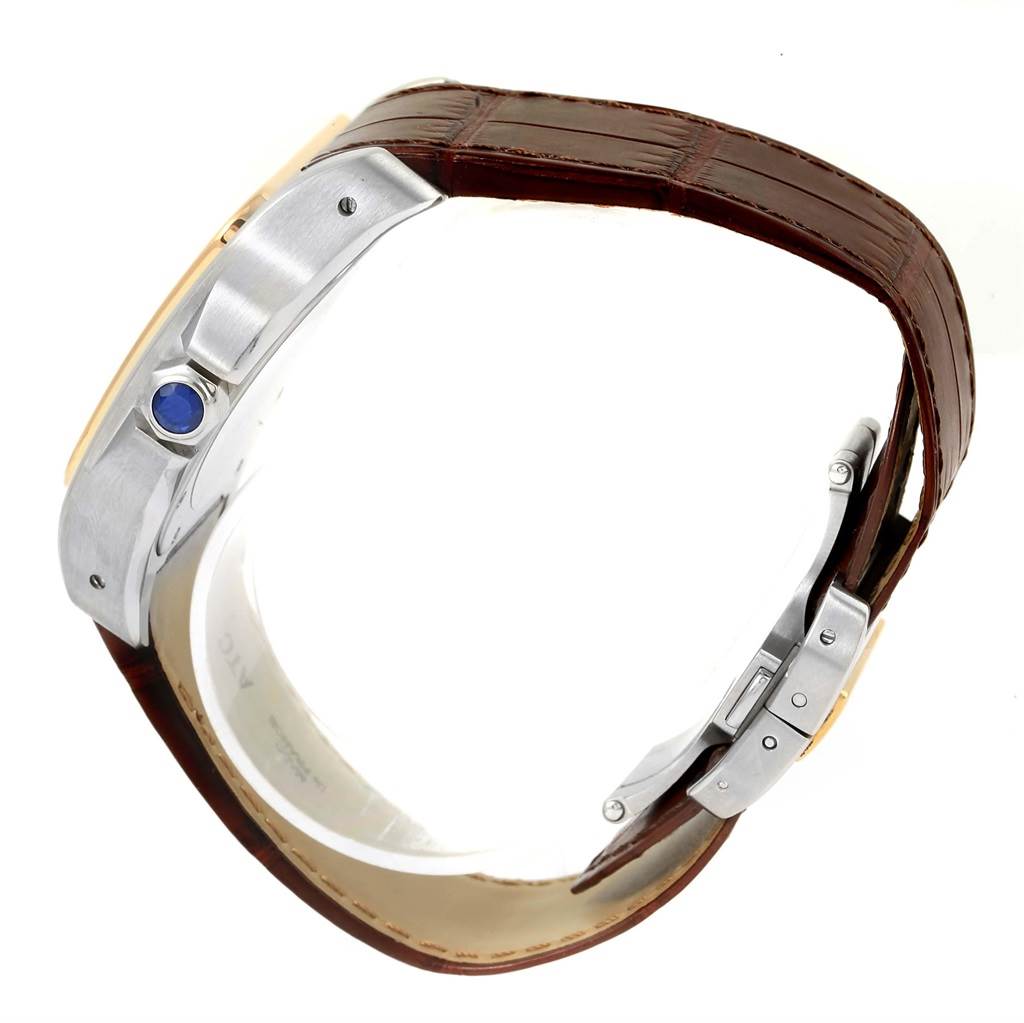 The image shows a side view of the Santos model by Cartier, focusing on the crown, bezel, and strap.