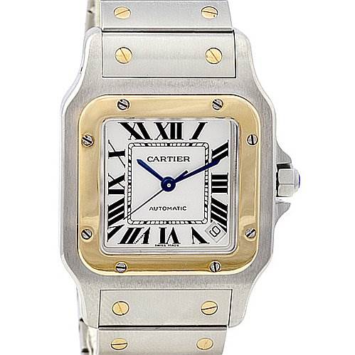 The image shows a frontal view of the Cartier Santos W20099C4 Stainless Steel Silver Dial W20099C4 Stainless Steel Silver Dial watch featuring a two-tone bezel, Roman numerals, and a metal bracelet.