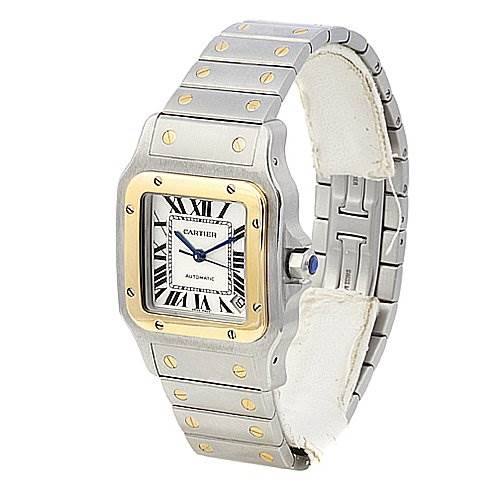 The image shows a Cartier Santos W20099C4 Stainless Steel Silver Dial W20099C4 Stainless Steel Silver Dial watch at an angle displaying its face, bezel, and bracelet.