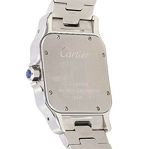 The image shows the back case and part of the bracelet of a Santos model by Cartier.