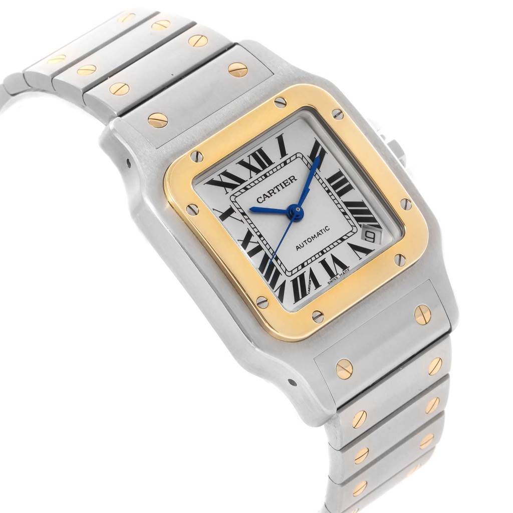 This Cartier Santos W20099C4 Men
s Stainless Steel Silver Dial W20099C4 Men
s Stainless Steel Silver Dial watch is shown at a slight angle, displaying its face, bezel, and part of its bracelet.