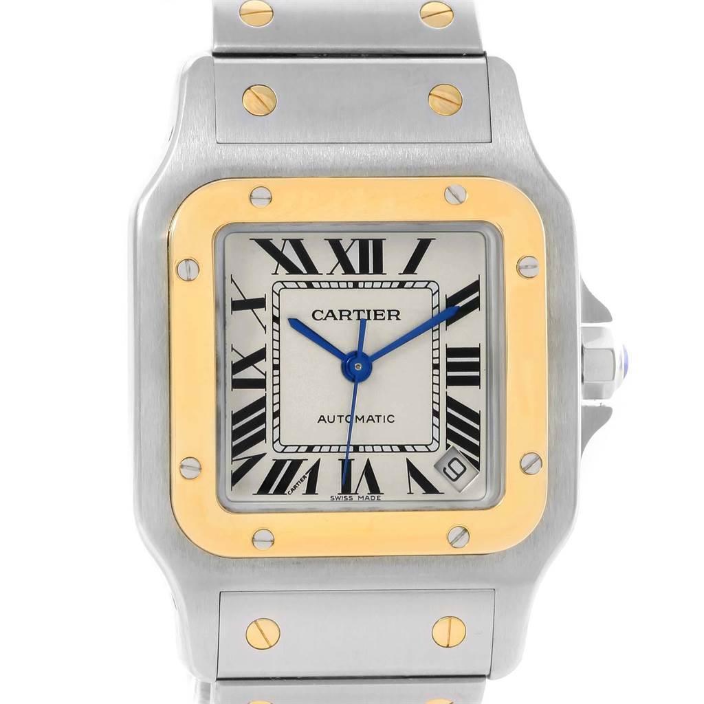 The image shows a front view of a Cartier Santos W20099C4 Men
s Stainless Steel Silver Dial W20099C4 Men
s Stainless Steel Silver Dial watch, highlighting its face, bezel, and part of the bracelet.
