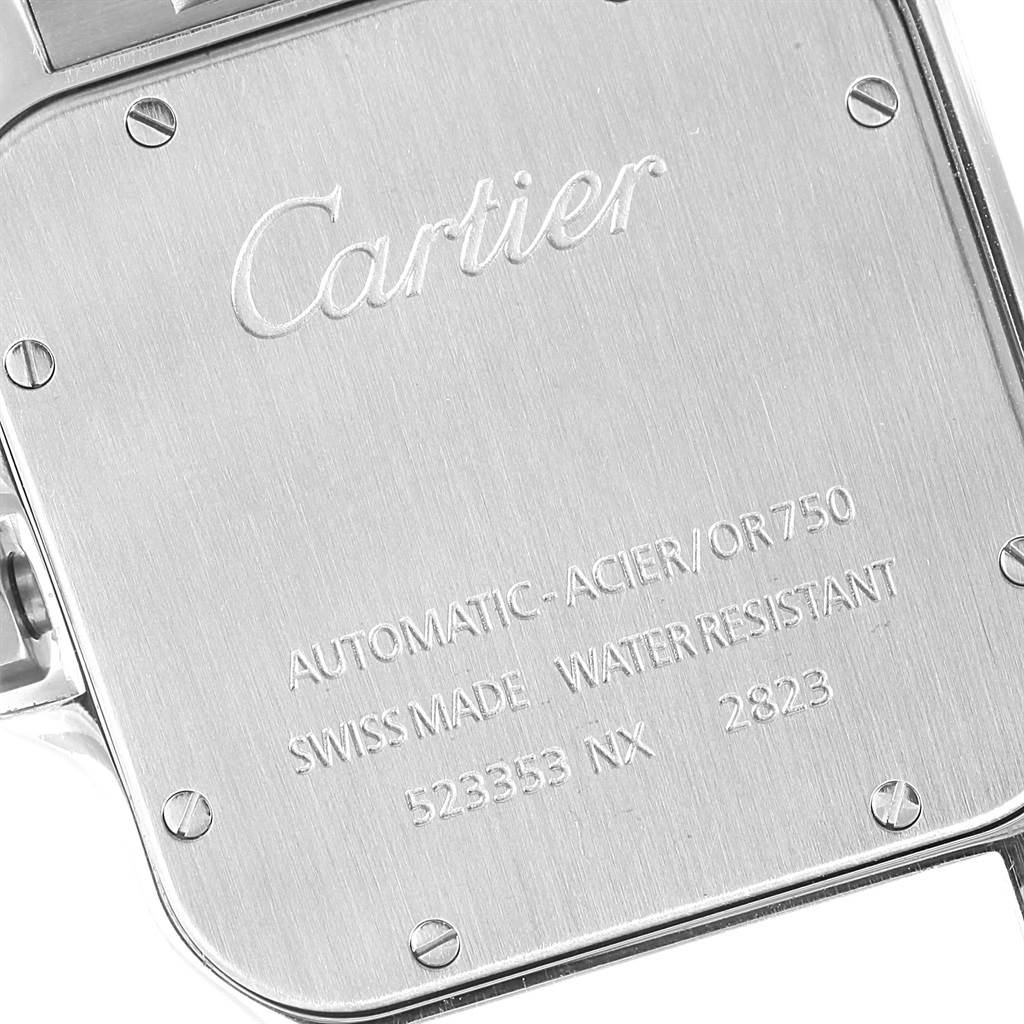 The image shows the back case of a Cartier Santos W20099C4 Men
s Stainless Steel Silver Dial W20099C4 Men
s Stainless Steel Silver Dial model watch, highlighting its branding and specifications. 