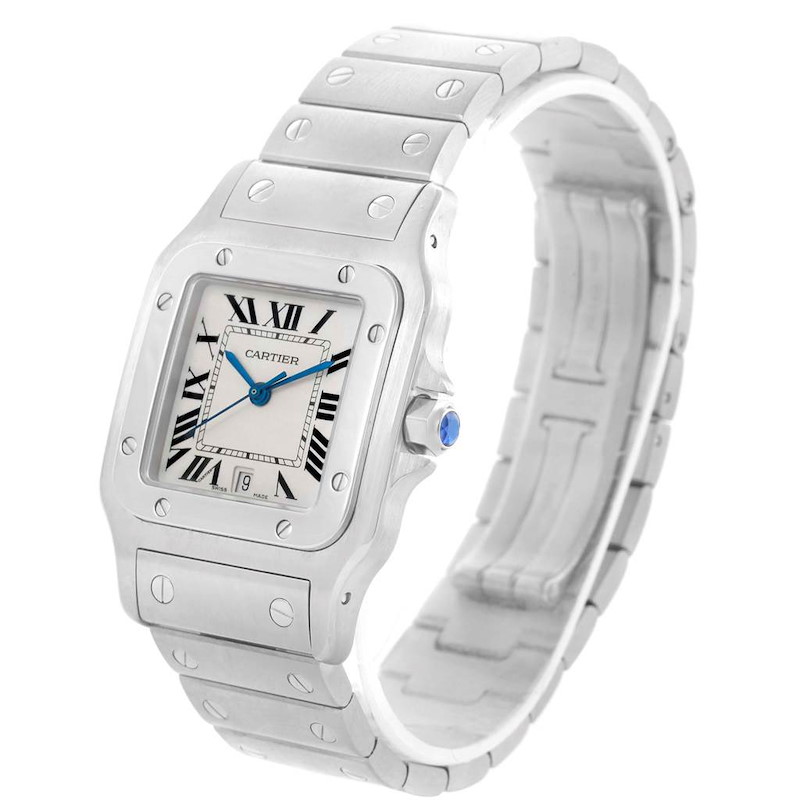 The image shows a Cartier Santos watch viewed at an angle that displays both the face and the linked bracelet.