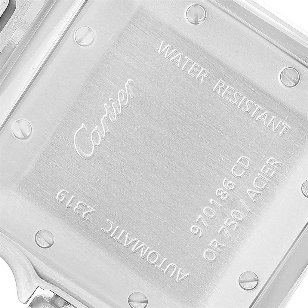 The image shows the back of a Cartier Santos W20058C4 Men's Stainless Steel Silver Dial W20058C4 Men's Stainless Steel Silver Dial watch, highlighting the engraving and screws on the case back.