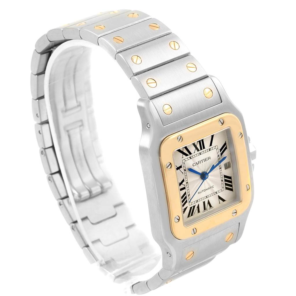 The image shows the Cartier Santos W20058C4 Men's Stainless Steel Silver Dial W20058C4 Men's Stainless Steel Silver Dial watch from a three-quarter angle, highlighting the dial, bezel, and bracelet.