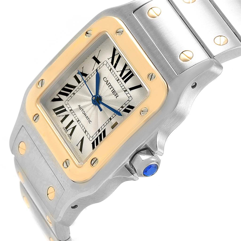 The Cartier Santos W20058C4 Men's Stainless Steel Silver Dial W20058C4 Men's Stainless Steel Silver Dial watch is shown from an angle emphasizing its face, bezel, and part of the bracelet.