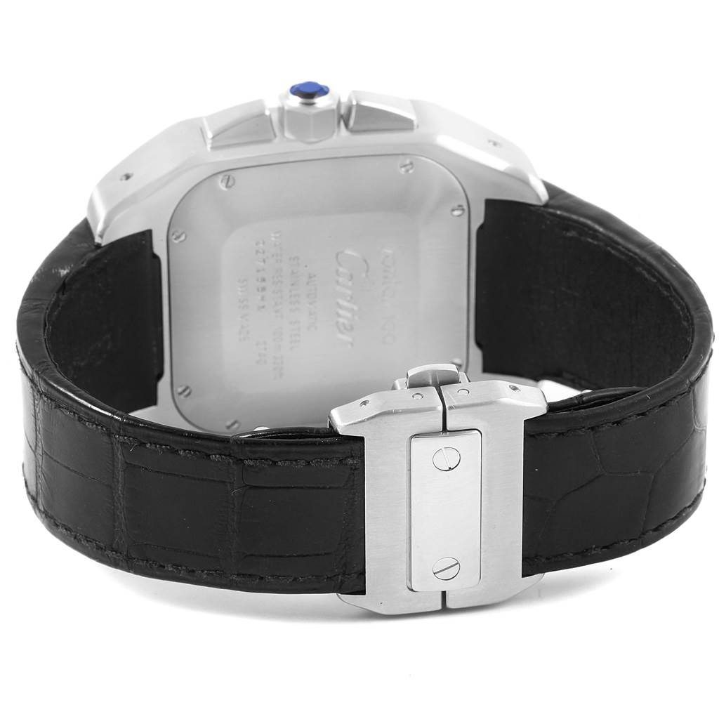 This image shows the back view of a Cartier Santos W20090X8 Men
s Stainless Steel Silver Dial W20090X8 Men
s Stainless Steel Silver Dial watch, including its case back, black leather strap, and buckle clasp.
